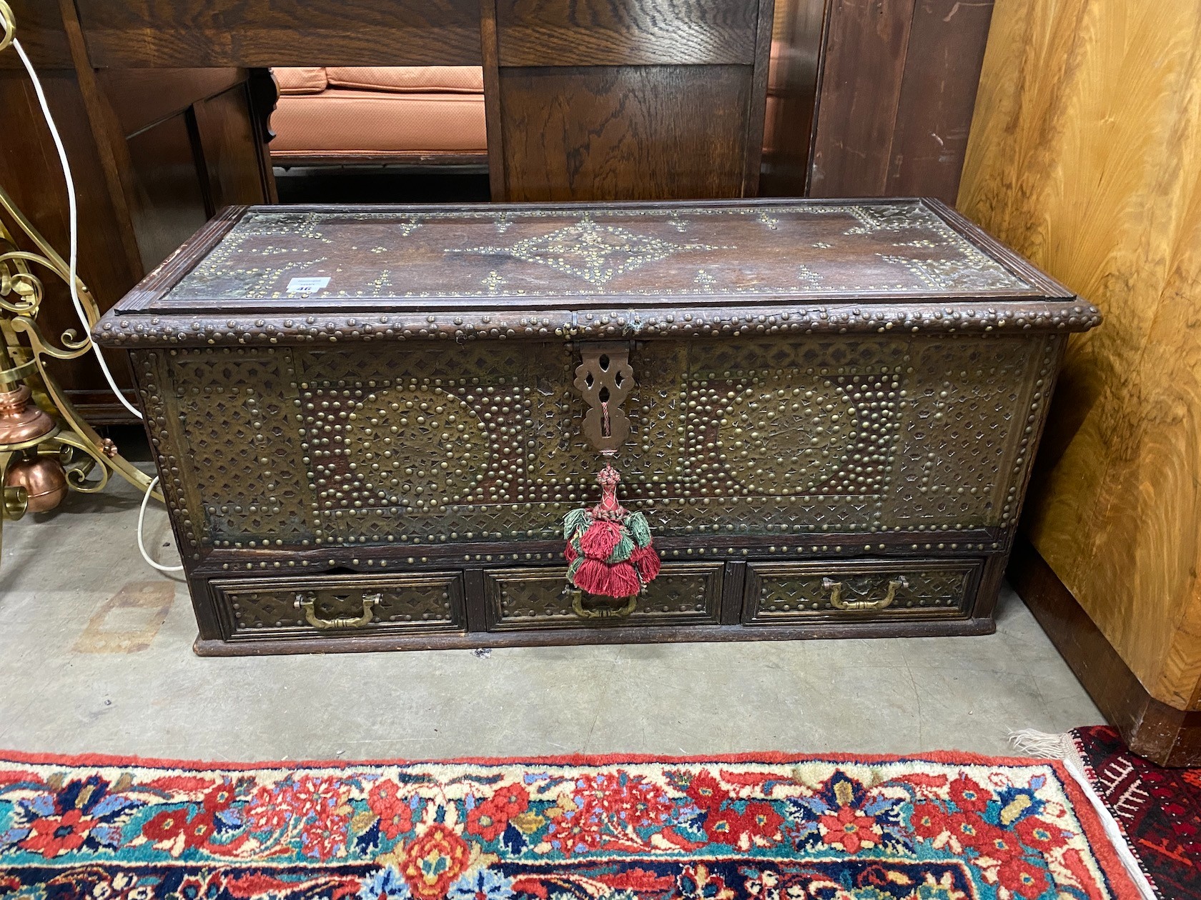 A studded Moroccan coffer, length 100cm, depth 45cm, height 45cm